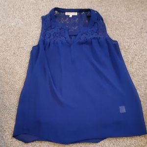 Sheer top with blue tank